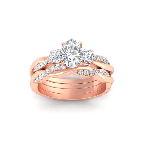 oval-shaped-three-stone-twisted-diamond-wedding-band-in-rose-gold-fdens3301ovangle5-nl-rg.jpg
