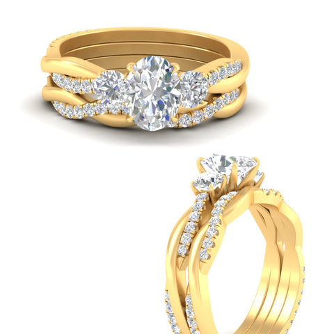oval-shaped-three-stone-twisted-diamond-wedding-band-in-yellow-gold-fdens3301ovangle3-nl-yg.jpg