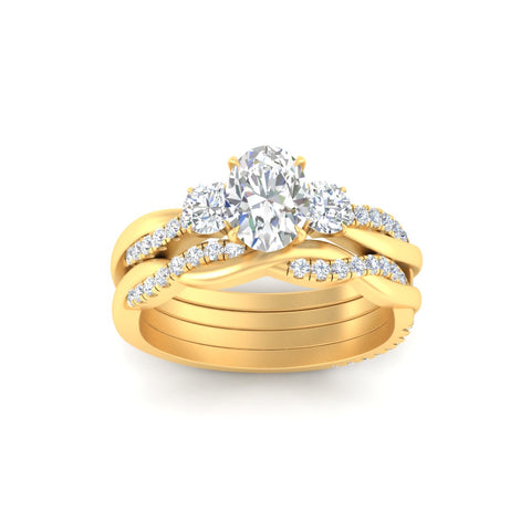 oval-shaped-three-stone-twisted-diamond-wedding-band-in-yellow-gold-fdens3301ovangle5-nl-yg.jpg