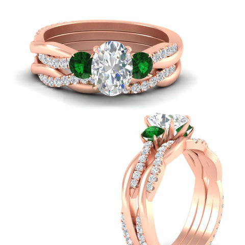 oval-shaped-three-stone-twisted-emerald-wedding-band-in-rose-gold-fdens3301ovgemgrangle3-nl-rg.jpg