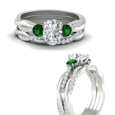oval-shaped-three-stone-twisted-emerald-wedding-band-in-white-gold-fdens3301ovgemgrangle3-nl-wg.jpg