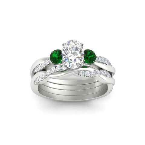 oval-shaped-three-stone-twisted-emerald-wedding-band-in-white-gold-fdens3301ovgemgrangle5-nl-wg.jpg