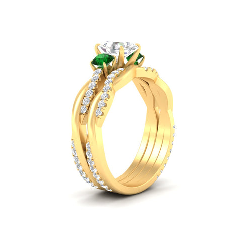 oval-shaped-three-stone-twisted-emerald-wedding-band-in-yellow-gold-fdens3301ovgemgrangle2-nl-yg.jpg