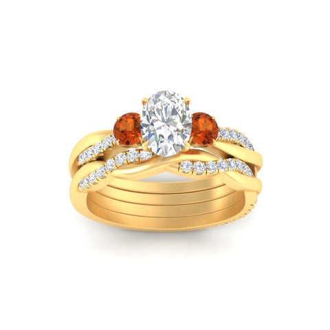 oval-shaped-three-stone-twisted-orange-sapphire-wedding-band-in-yellow-gold-fdens3301ovgsaorangle5-nl-yg.jpg