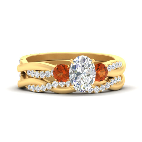 oval-shaped-three-stone-twisted-orange-sapphire-wedding-band-in-yellow-gold-fdens3301ovgsaorsleep-nl-yg.jpg
