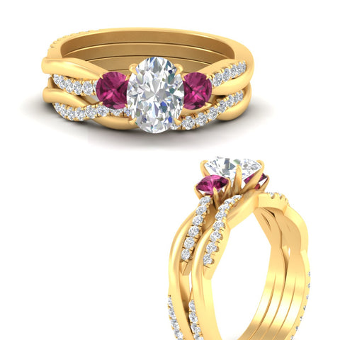 oval-shaped-three-stone-twisted-pink-sapphire-wedding-band-in-yellow-gold-fdens3301ovgsadrpiangle3-nl-yg.jpg