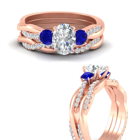oval-shaped-three-stone-twisted-sapphire-wedding-band-in-rose-gold-fdens3301ovgsablangle3-nl-rg.jpg