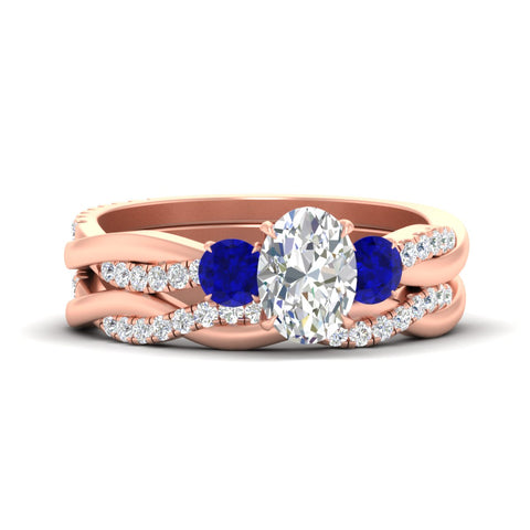 oval-shaped-three-stone-twisted-sapphire-wedding-band-in-rose-gold-fdens3301ovgsablsleep-nl-rg.jpg
