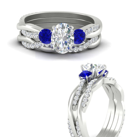 oval-shaped-three-stone-twisted-sapphire-wedding-band-in-white-gold-fdens3301ovgsablangle3-nl-wg.jpg