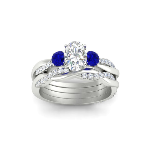 oval-shaped-three-stone-twisted-sapphire-wedding-band-in-white-gold-fdens3301ovgsablangle5-nl-wg.jpg