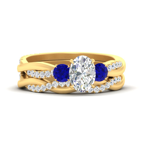 oval-shaped-three-stone-twisted-sapphire-wedding-band-in-yellow-gold-fdens3301ovgsablsleep-nl-yg.jpg