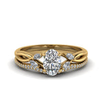 Load image into Gallery viewer, oval-shaped-twisted-diamond-bridal-set-in-14K-yellow-gold-FD8300OV-NL-YG.jpg
