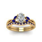 Load image into Gallery viewer, oval-shaped-twisted-diamond-bridal-set-with-blue-sapphire-in-14K-yellow-gold-FD8300OVGSABL-NL-YG.jpg
