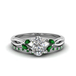 Load image into Gallery viewer, oval-shaped-twisted-diamond-bridal-set-with-emerald-in-14K-white-gold-FD8300OVGEMGR-NL-WG.jpg

