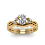 Load image into Gallery viewer, oval-shaped-twisted-diamond-ring-with-matching-curved-band-in-14K-yellow-gold-FD8300OV-NL-YG.jpg
