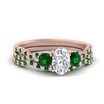 Load image into Gallery viewer, oval-shaped-twisted-floral-prong-emerald-wedding-set-in-rose-gold-FD10257OVGEMGR-NL-RG?v=1756360022
