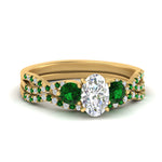 Load image into Gallery viewer, oval-shaped-twisted-floral-prong-emerald-wedding-set-in-yellow-gold-FD10257OVGEMGR-NL-YG?v=1756360021
