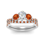 Load image into Gallery viewer, oval-shaped-twisted-floral-prong-orange-sapphire-wedding-set-in-white-gold-FD10257OVGSAOR-ANGLE5-NL-WG_f0986a45-4651-45be-9e1b-edeaa20fec22?v=1756360148
