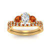 Load image into Gallery viewer, oval-shaped-twisted-floral-prong-orange-sapphire-wedding-set-in-yellow-gold-FD10257OVGSAOR-ANGLE5-NL-YG_95127eae-03a5-495f-a611-d365c2fecfeb?v=1756360148