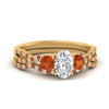 Load image into Gallery viewer, oval-shaped-twisted-floral-prong-orange-sapphire-wedding-set-in-yellow-gold-FD10257OVGSAOR-NL-YG_48e956f1-91d6-4a29-8421-ec1df8e6c2a1?v=1756360148