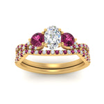 Load image into Gallery viewer, oval-shaped-twisted-floral-prong-pink-sapphire-wedding-set-in-yellow-gold-FD10257OVGSADRPI-ANGLE5-NL-YG?v=1756360021
