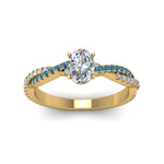 Load image into Gallery viewer, oval-shaped-twisted-vine-diamond-engagement-ring-for-women-with-ice-blue-topaz-in-14K-yellow-gold-FD8233OVRGICBLTO-NL-YG.jpg
