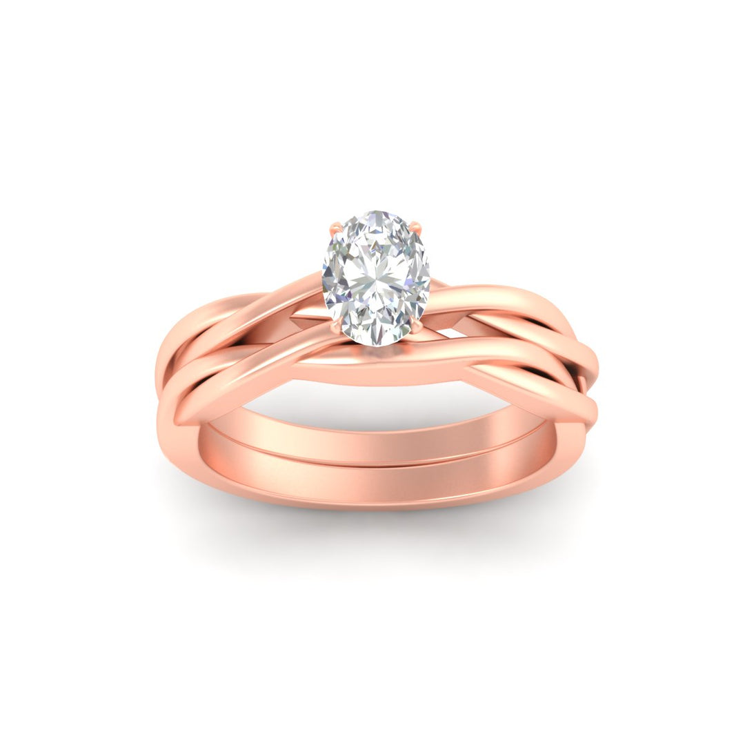 oval-shaped-vine-inspired-solitaire-bridal-ring-set-in-rose-gold-fdens8252ovangle5-nl-rg.jpg?v=1767085002