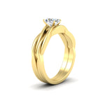 Load image into Gallery viewer, oval-shaped-vine-inspired-solitaire-bridal-ring-set-in-yellow-gold-fdens8252ovangle2-nl-yg.jpg?v=1767085003