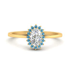 Load image into Gallery viewer, oval-sunflower-halo-blue-topaz-engagement-ring-in-yellow-gold-FD9704OVRGICBLTO-NL-YG
