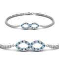 Thumbnail 48 - pave-infinity-diamond-bracelet-with-blue-topaz-in-white-gold-FDBRC9140GICBLTOANGLE2-NL-WG