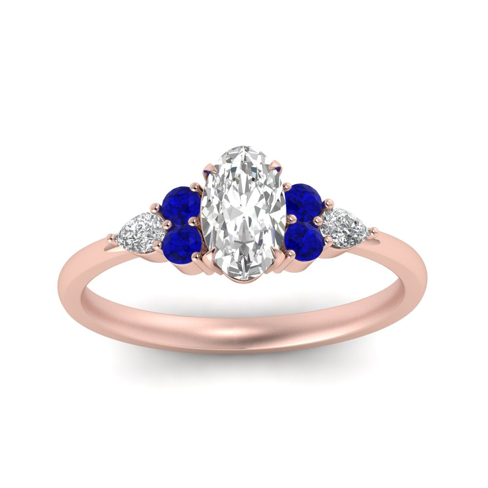 pear-accented-oval-shaped-diamond-ring-with-sapphire-in-FD9289OVRGSABLANGLE3-NL-RG
