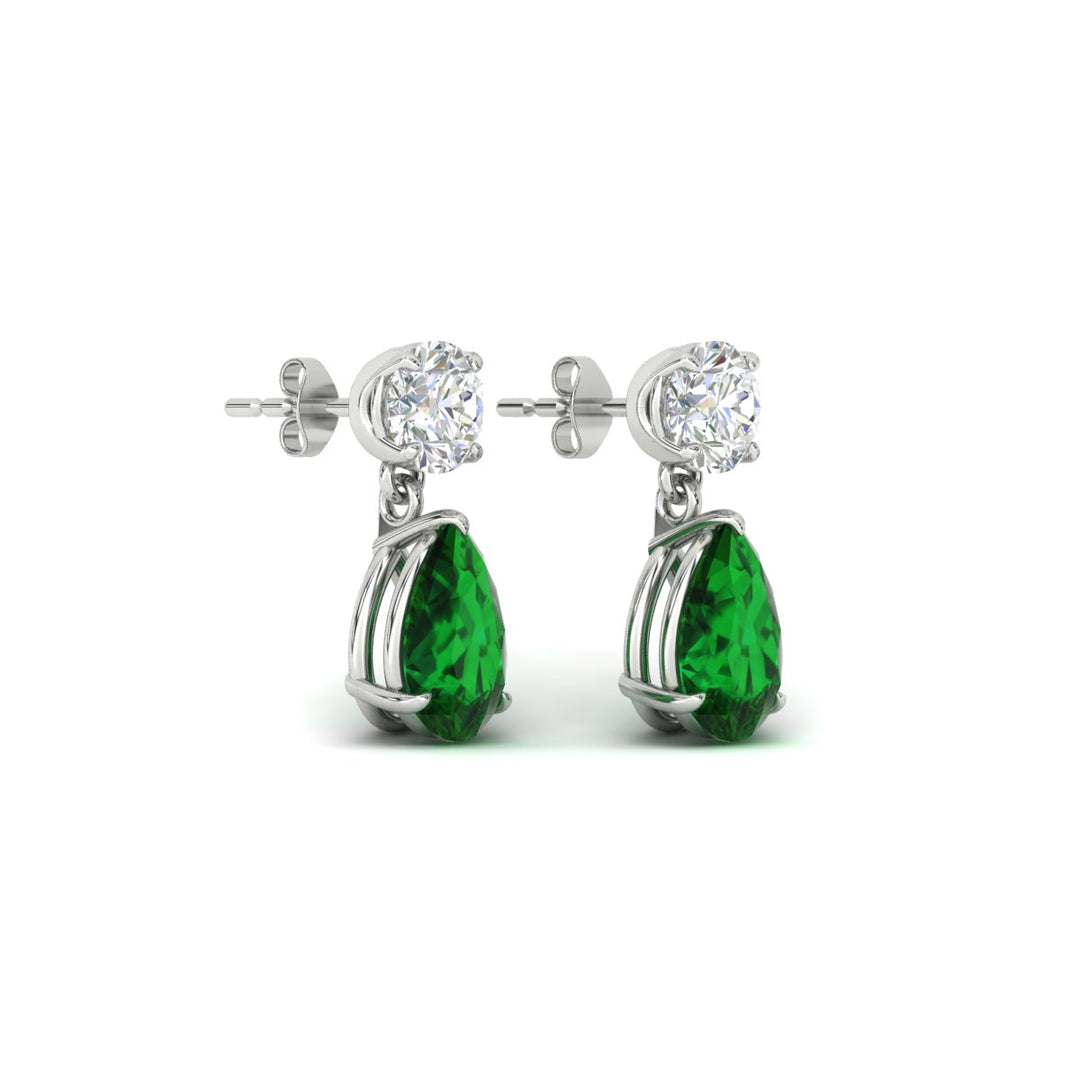 pear-cut-emerald-stud-earrings-with-drop-design-in-white-gold-fdear11550pegemgrangle4-nl-wg_e4f497e9-9686-4aa2-a509-e85ae7d85809.jpg?v=1769058047