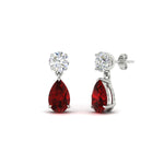 Load image into Gallery viewer, pear-cut-ruby-stud-earrings-with-drop-design-in-white-gold-fdear11550pegrudrangle1-nl-wg_0a1c4d95-000c-438f-a51b-9a952501c0d3.jpg?v=1769058047