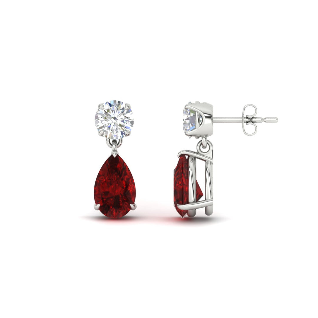 pear-cut-ruby-stud-earrings-with-drop-design-in-white-gold-fdear11550pegrudrangle3-nl-wg_f7dc99ad-e1d3-43f8-bad5-beed44007a8b.jpg?v=1769058047