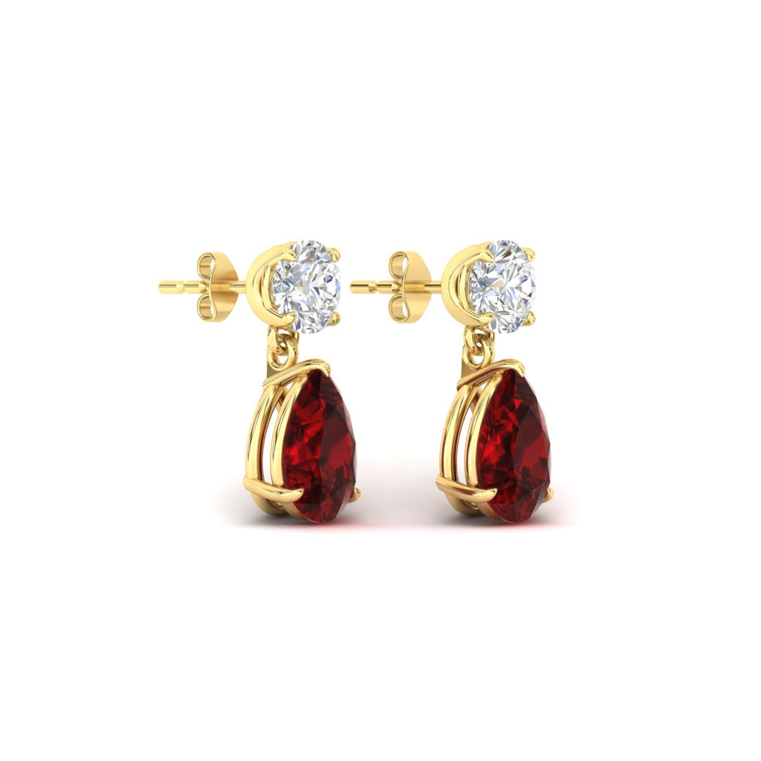 pear-cut-ruby-stud-earrings-with-drop-design-in-yellow-gold-fdear11550pegrudrangle4-nl-yg.jpg?v=1769059227