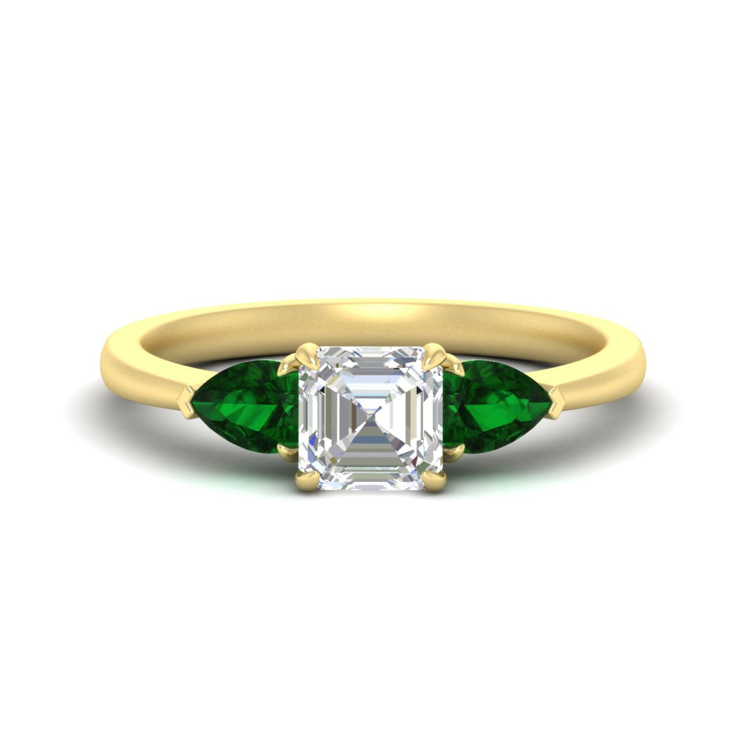 pear-diamond-cathedral-asscher-cut-engagement-ring-with-emerald-in-yellow-gold-fdenr9210asrgemgrsleep-nl-yg_8e205dc6-93f7-4178-b5b0-8263d944331c.jpg?v=1758259331