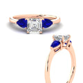 Thumbnail 6 - pear-diamond-cathedral-asscher-cut-engagement-ring-with-sapphire-in-rose-gold-fdenr9210asrgsablangle3-nl-rg.jpg?v=1758259331