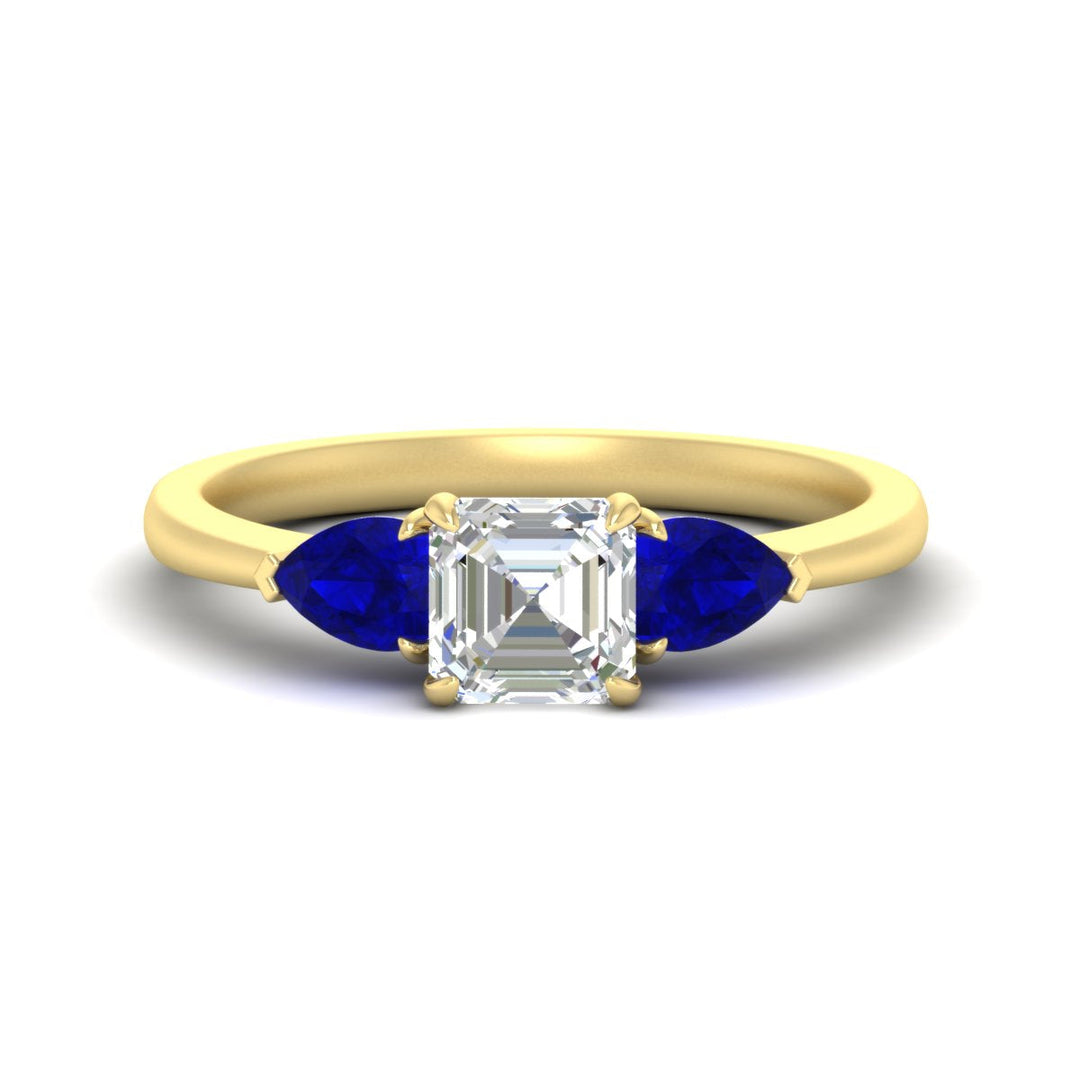 pear-diamond-cathedral-asscher-cut-engagement-ring-with-sapphire-in-yellow-gold-fdenr9210asrgsablsleep-nl-yg_3b1601af-1938-4bfe-a18b-80b667780f59.jpg?v=1758259331