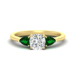 Load image into Gallery viewer, pear-diamond-cathedral-cushion-cut-engagement-ring-with-emerald-in-yellow-gold-fdenr9210curgemgrsleep-nl-yg_64f351e4-fc34-40c4-9313-9a1c9443d74a?v=1757583691

