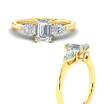 Load image into Gallery viewer, pear-diamond-cathedral-emerald-cut-engagement-ring-in-yellow-gold-fdenr9210emrangle3-nl-yg.jpg?v=1758097711
