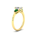 Load image into Gallery viewer, pear-diamond-cathedral-emerald-cut-engagement-ring-with-emerald-in-yellow-gold-fdenr9210emrgemgrangle2-nl-yg