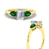 Load image into Gallery viewer, pear-diamond-cathedral-emerald-cut-engagement-ring-with-emerald-in-yellow-gold-fdenr9210emrgemgrangle3-nl-yg.jpg?v=1758097711