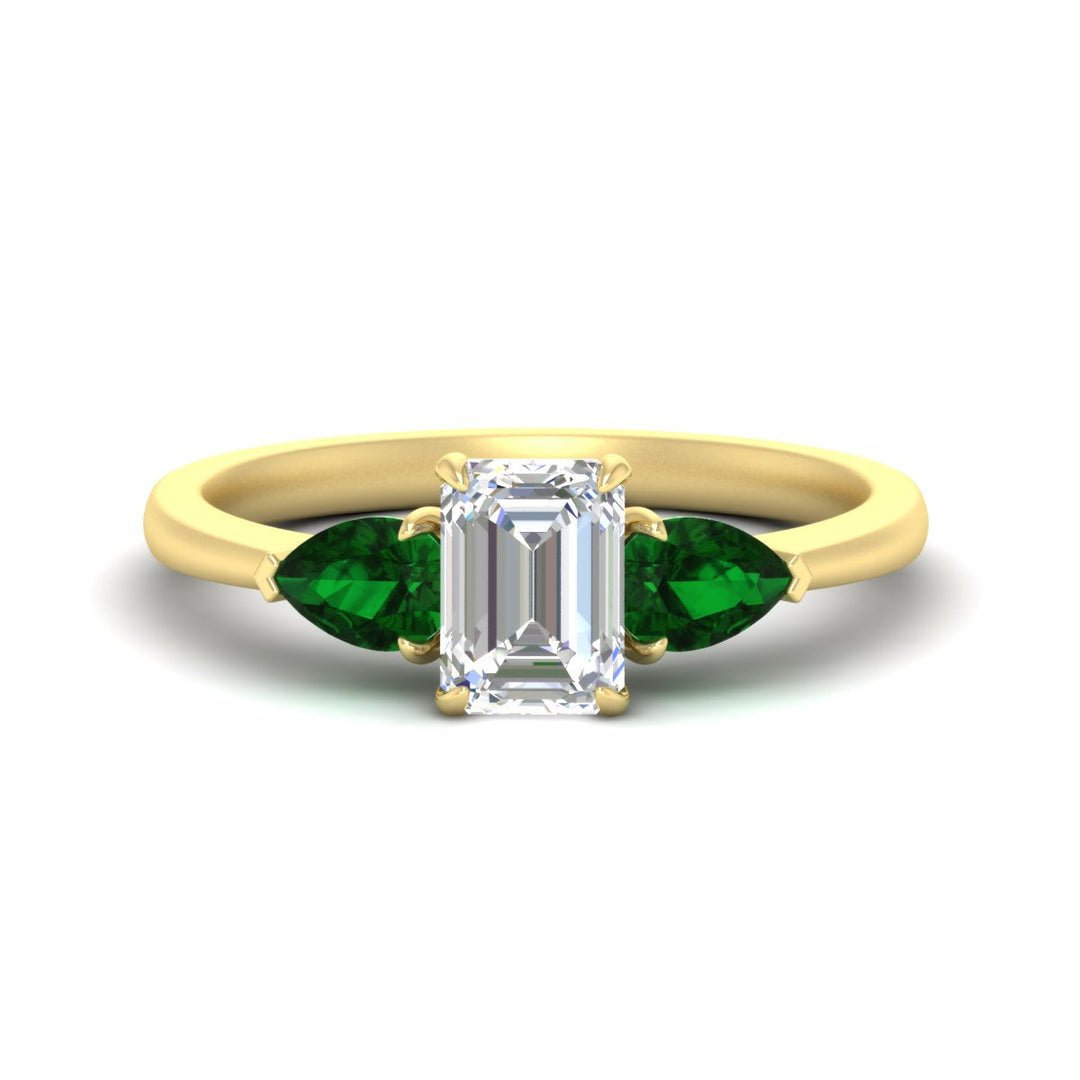 pear-diamond-cathedral-emerald-cut-engagement-ring-with-emerald-in-yellow-gold-fdenr9210emrgemgrsleep-nl-yg_09a2a247-b72e-435c-adef-7a0914a8d2bc.jpg?v=1758097711