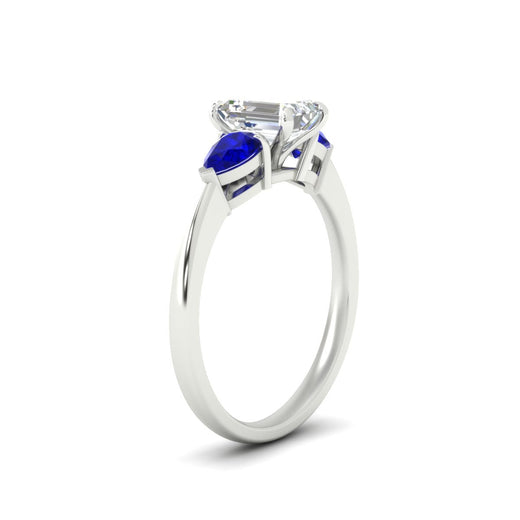 pear-diamond-cathedral-emerald-cut-engagement-ring-with-sapphire-in-white-gold-fdenr9210emrgsablangle2-nl-wg.jpg?v=1758097711