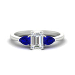 Load image into Gallery viewer, pear-diamond-cathedral-emerald-cut-engagement-ring-with-sapphire-in-white-gold-fdenr9210emrgsablsleep-nl-wg_e002258a-dc3c-46b6-966c-a63ab2149249.jpg?v=1758097711
