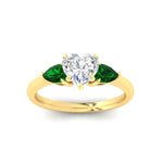 Load image into Gallery viewer, pear-diamond-cathedral-heart-shaped-engagement-ring-with-emerald-in-yellow-gold-fdenr9210htrgemgrangle5-nl-yg
