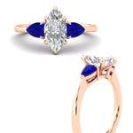 Load image into Gallery viewer, pear-diamond-cathedral-marquise-cut-engagement-ring-with-sapphire-in-rose-gold-fdenr9210mqrgsablangle3-nl-rg.jpg?v=1758088108
