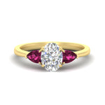 Load image into Gallery viewer, pear-diamond-cathedral-oval-shaped-engagement-ring-with-pink-sapphire-in-yellow-gold-fdenr9210ovrgsadrpisleep-nl-yg_5b9b65b3-4a70-43b3-92c9-a9bb3e502c8f.jpg?v=1758087322

