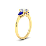 Load image into Gallery viewer, pear-diamond-cathedral-pear-shaped-engagement-ring-with-sapphire-in-yellow-gold-fdenr9210pergsablangle2-nl-yg

