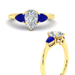 Load image into Gallery viewer, pear-diamond-cathedral-pear-shaped-engagement-ring-with-sapphire-in-yellow-gold-fdenr9210pergsablangle3-nl-yg
